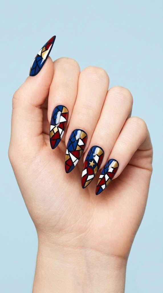 stained glass mosaic 4th of july nail art in red navy gold with geometric patriotic pattern