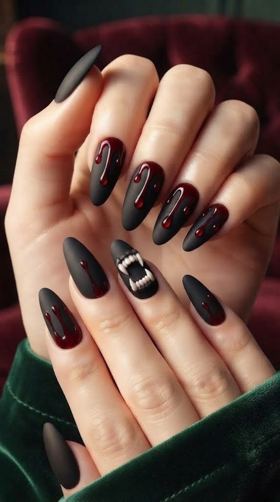 vampire nails with sculpted fangs and crimson blood drips