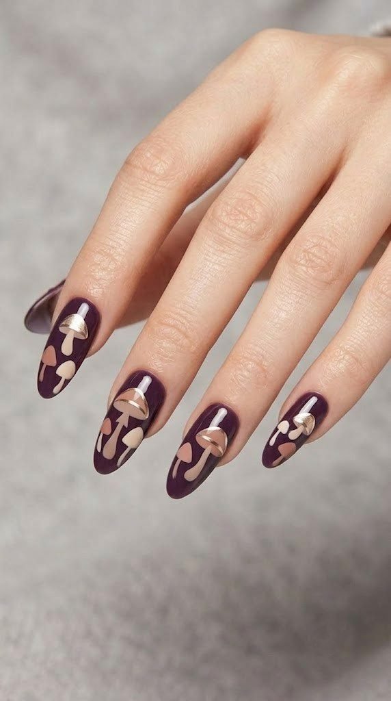 Fig purple almond nails with fairytale mushrooms capped in champagne chrome