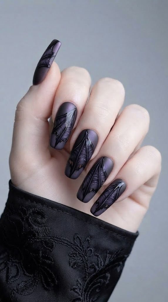 Halloween nail art ideas with realistic leathery bat wing texture