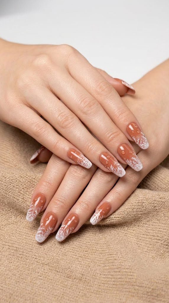 Terracotta clay nails fade into a frosted white tip, capturing classy nail designs for fall.
