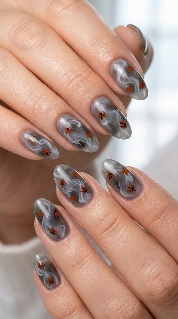Milky grey fall almond nails with soft mist and burnt orange leaves