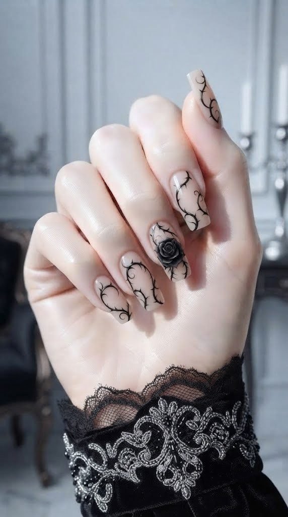dramatic nail designs with a realistic 3D rose and curling thorns