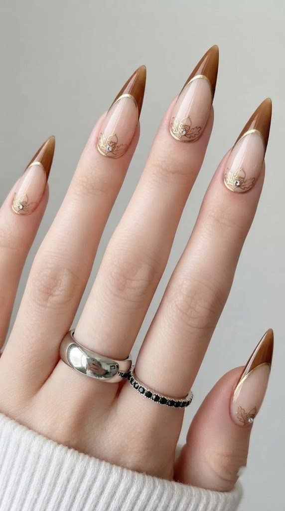 fall French tip nails in chestnut brown with acorn leaf motif