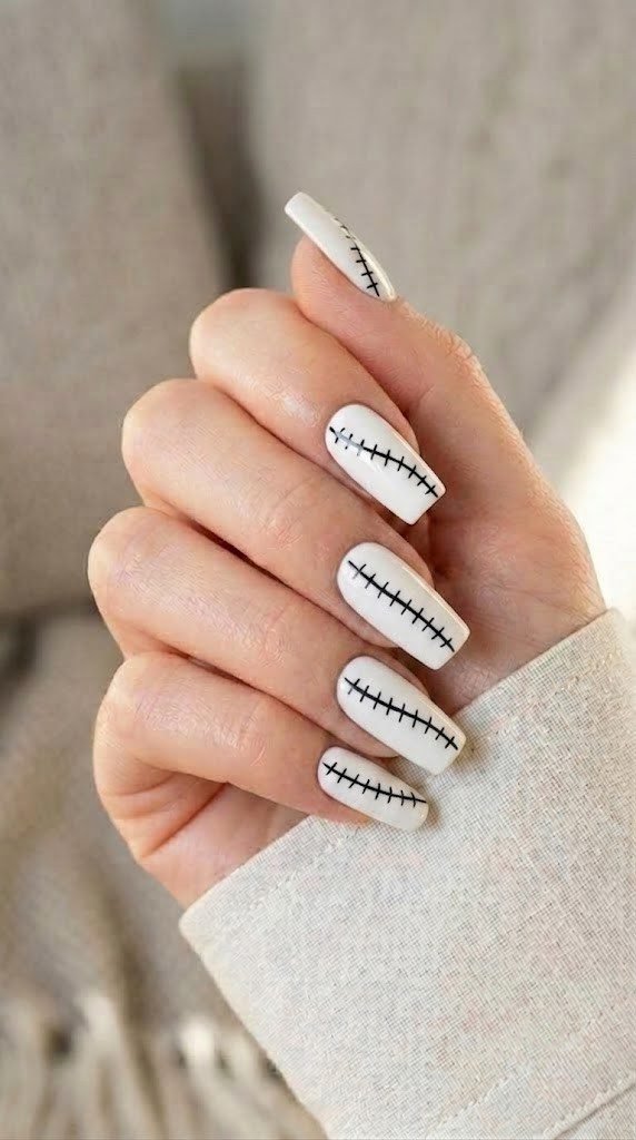 Graphic halloween square nail designs with black stitch monster detail