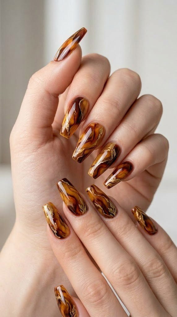 Amber to cinnamon gradient fall nail design with high gloss finish