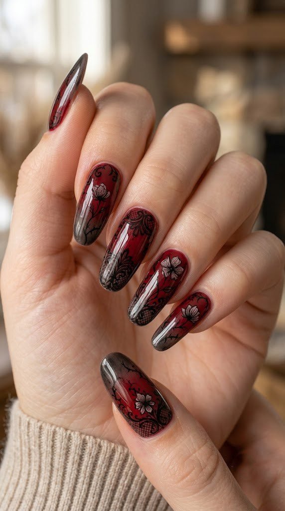 Blood red and blackened taupe nails with Victorian filigree and skeletal floral details