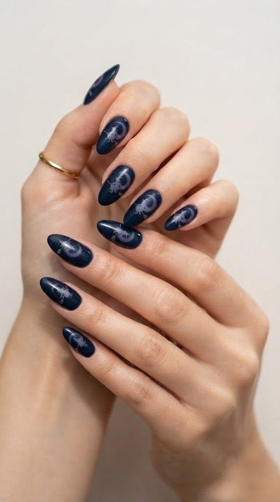 Night sky blue nails with a witch on a broomstick under a purple moon