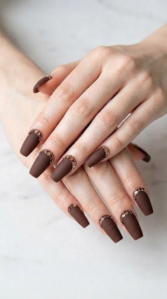Matte chocolate brown coffin nails with bronze beads, a classy autumn nails pick