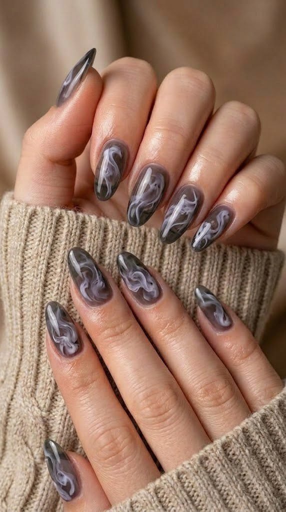 Scary halloween nails with smoky charcoal ghost mist design