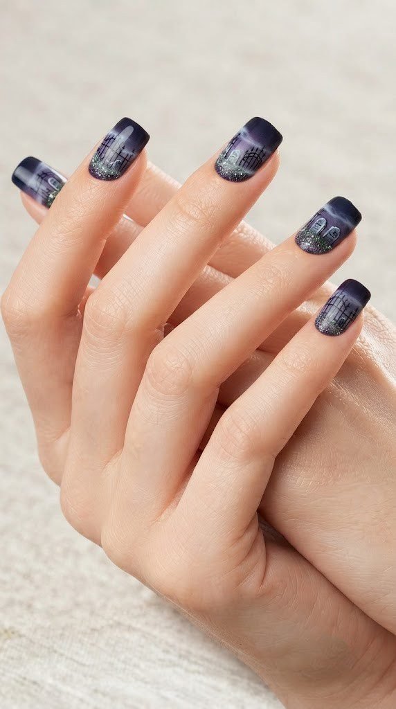 Purple navy nails with tombstones and wrought-iron gates, atmospheric Halloween nail designs