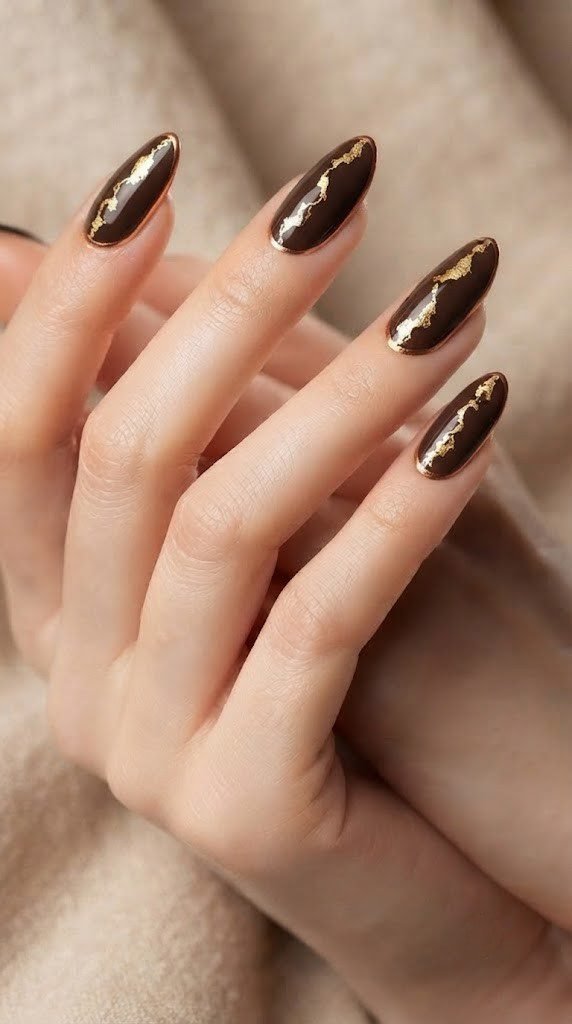 Espresso nails with cracked gold leaf detailing inspired by kintsugi pottery