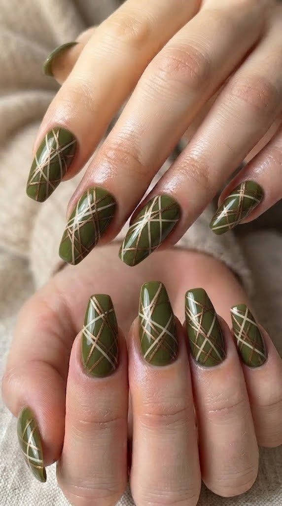 Olive green fall nail design with bronze and cream mesh linework