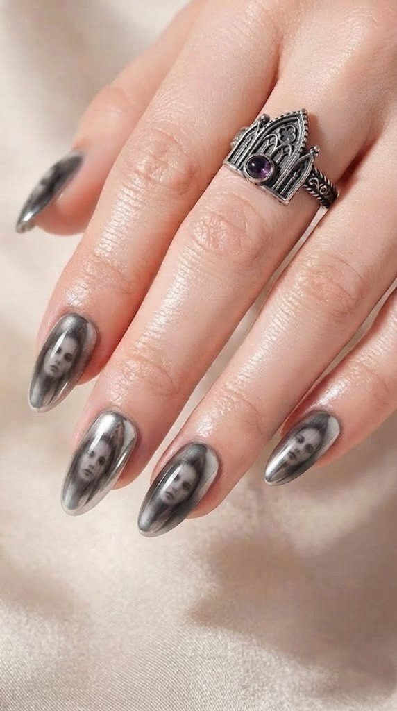 Silver chrome nails with smoky trapped face silhouettes, a conceptual Halloween nail design