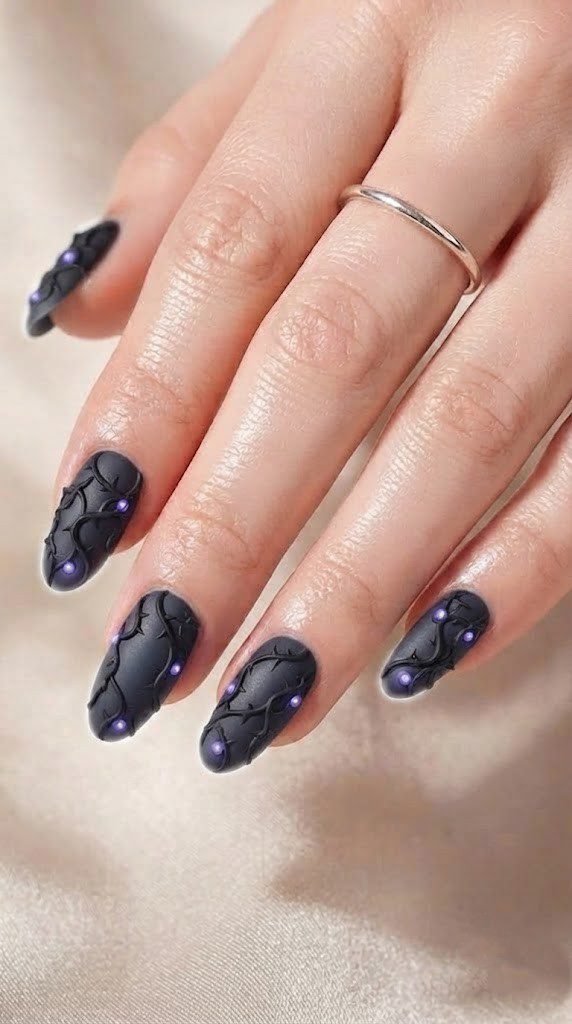 hort oval acrylic Halloween nails with black thorny vines and violet berries