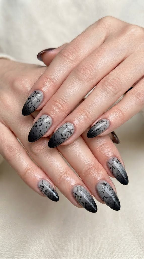 Dark halloween nails with cracked stone and nightshade vines