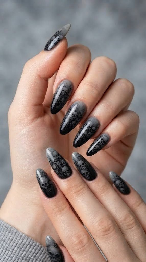 Stone-gray halloween nail designs with carved skull details