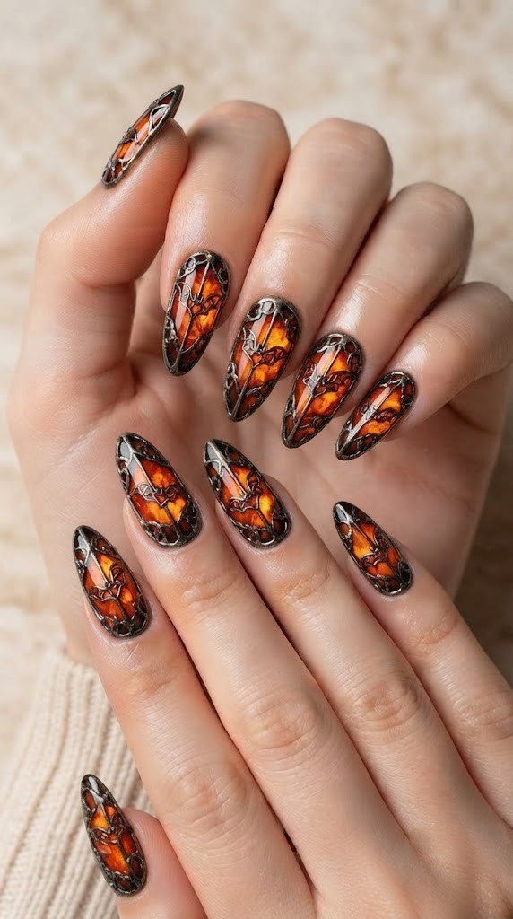 Stained glass bat grille orange and black nails with mosaic detailing