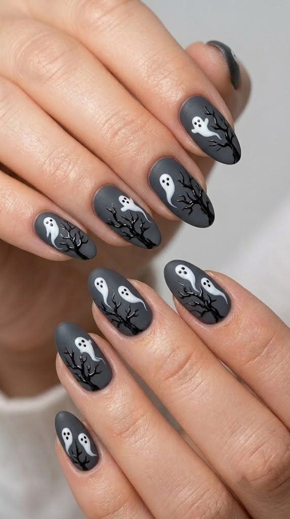 Charcoal gray halloween nails with matte white ghost figures