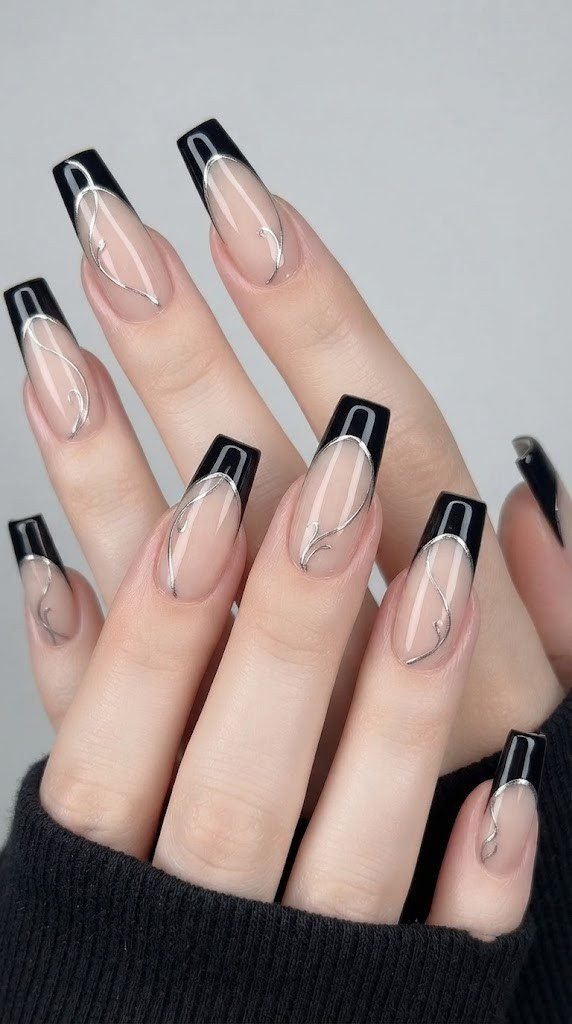 Coffin fall French tip nail design with black tip and silver swirl vine